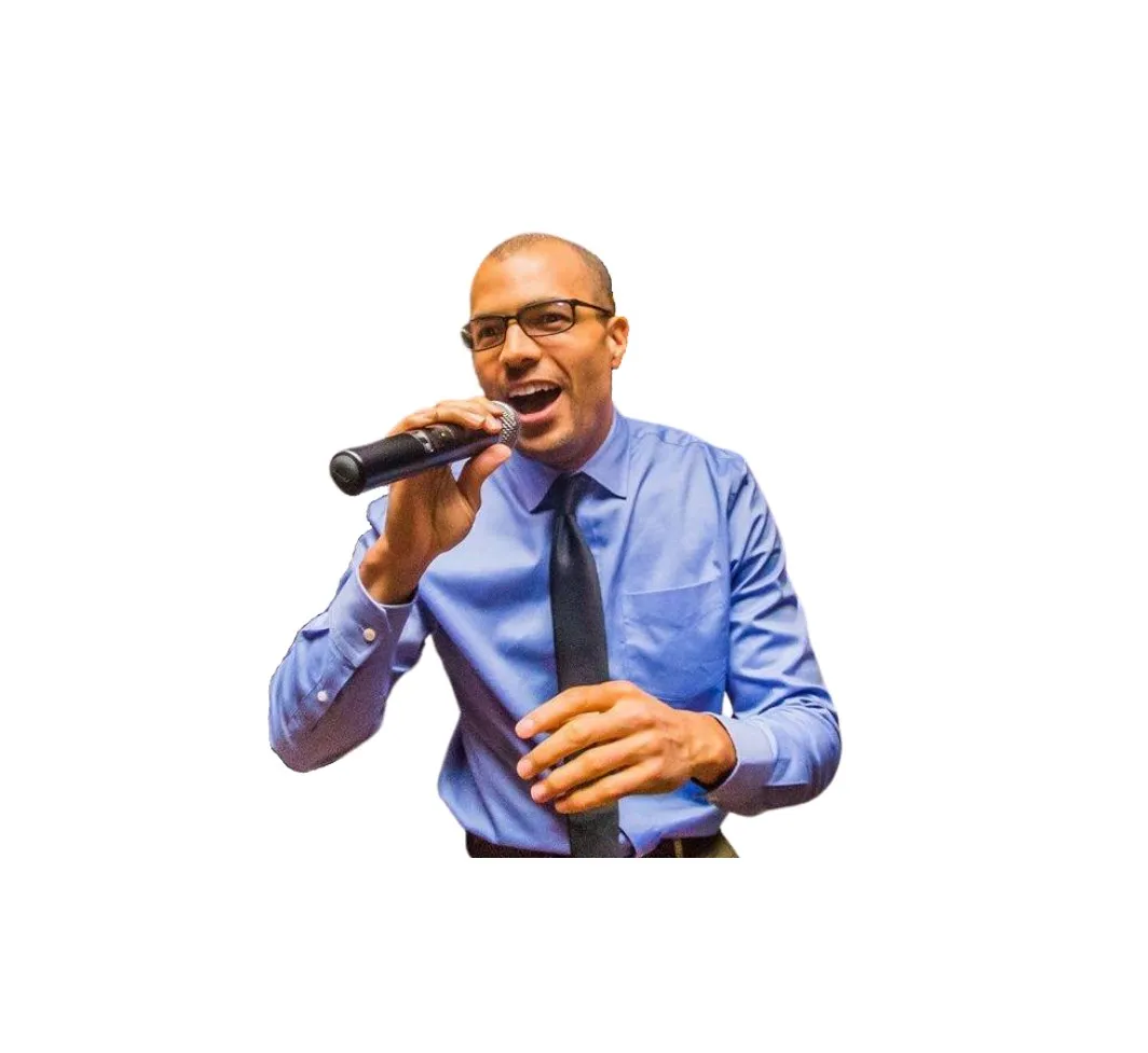 Ethan Stone performing with a microphone